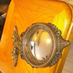 - Vintage round eagle mirror